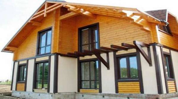 Этапы и нюансы строительства комбинированного дома из дерева и камня с фото