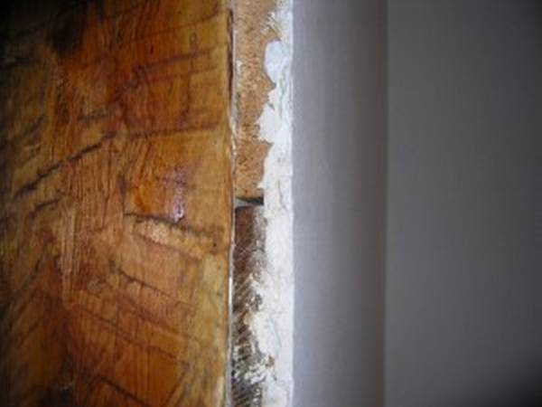 Штукатурка деревянных стен - фото